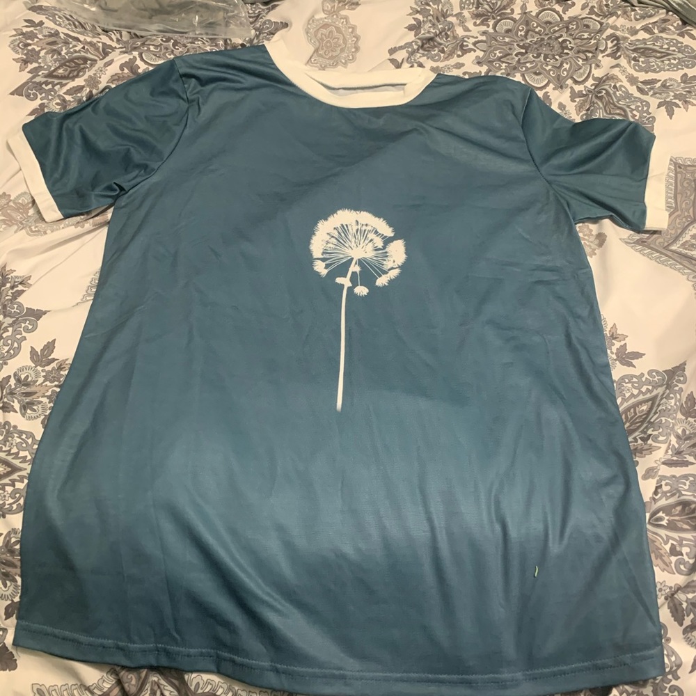 Brand new Women’s short sleeve tee.  Size M.